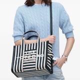 Blue bag worn by a person, showing the bag's fit