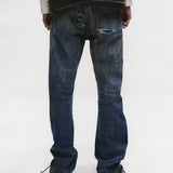 Blue pants worn by a person, showing the pants fit