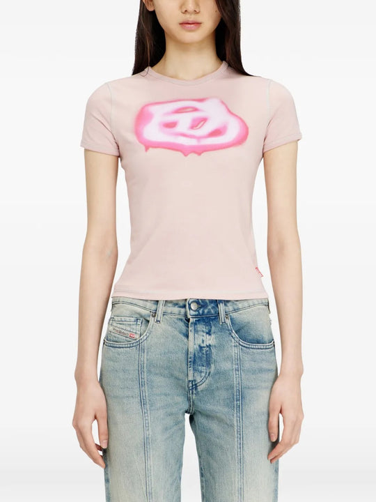 Pink t-shirts worn by a person, showing the t-shirts fit