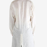 White jacket worn by a person, showing the jacket's fit