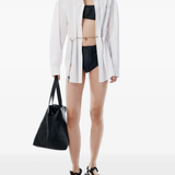 Black bag worn by a person, showing the bag fit