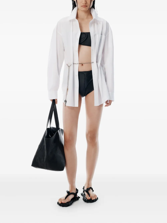 Black bag worn by a person, showing the bag fit