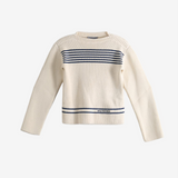 Tan knitwear, front view