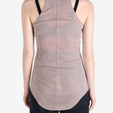Tan top worn by a person, showing the top fit