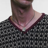 Black hoodie worn by a person, showing the hoodie fit