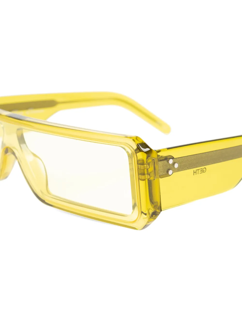 Close up of the yellow eyewear, showing texture of the acetate fabric