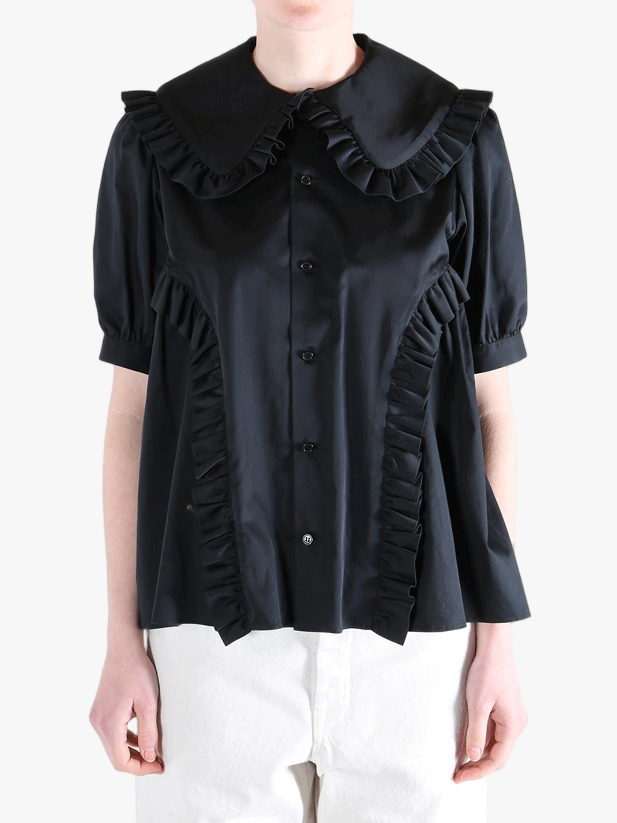 Black t-shirt worn by a person, showing the t-shirt's fit