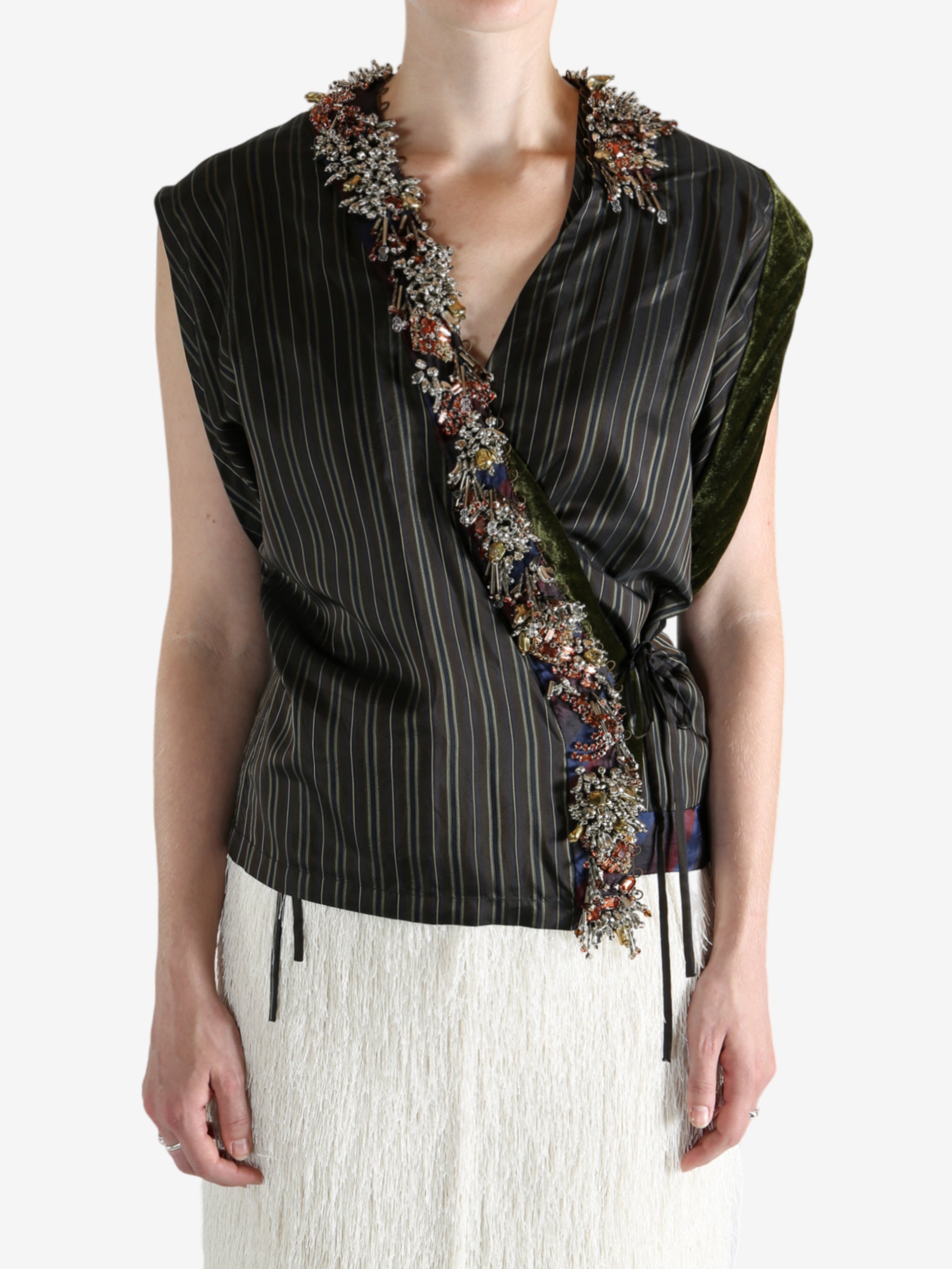 Brown top worn by a person, showing the top fit