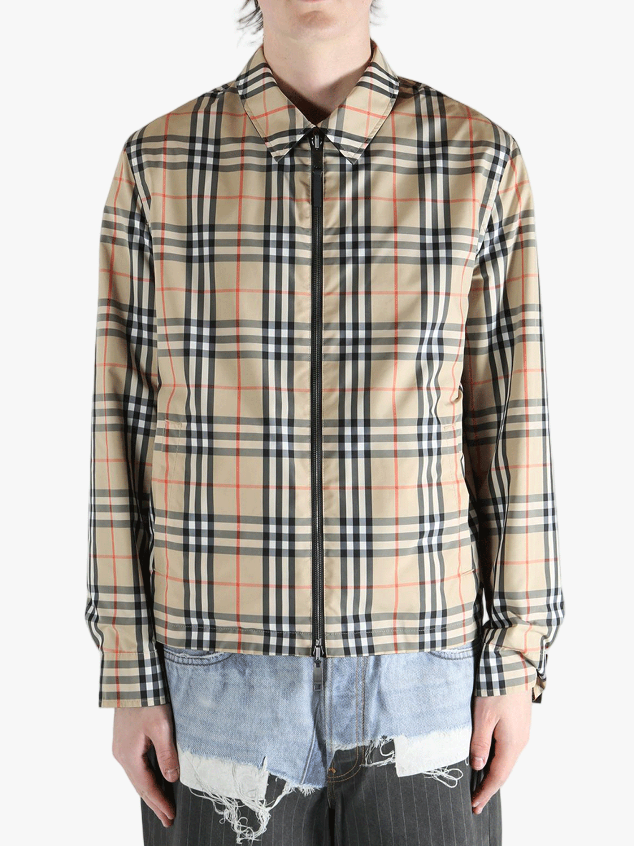 Yellow  jacket worn by a person, showing the  jacket's fit