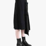 Black skirt worn by a person, showing the skirt fit