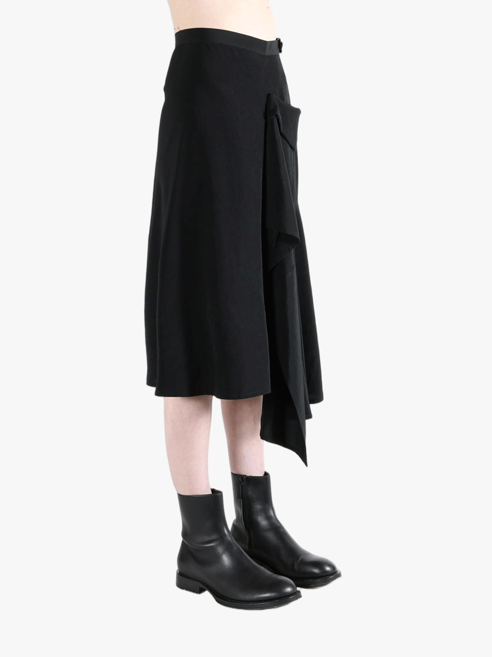 Black skirt worn by a person, showing the skirt fit