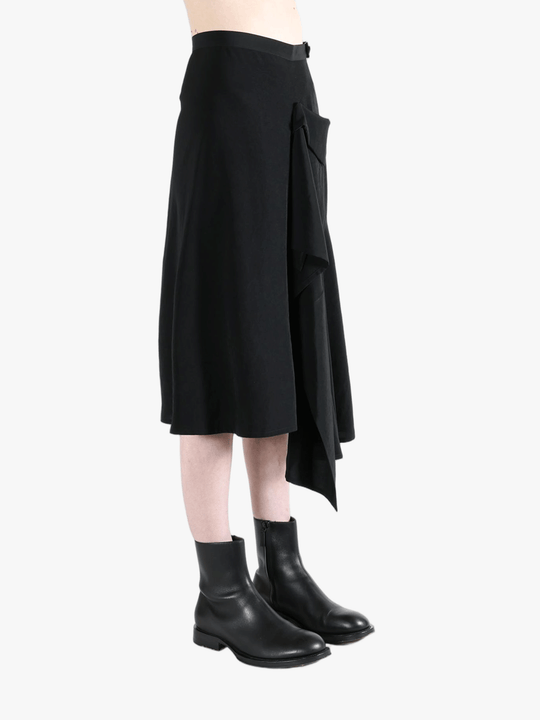 Black skirt worn by a person, showing the skirt fit