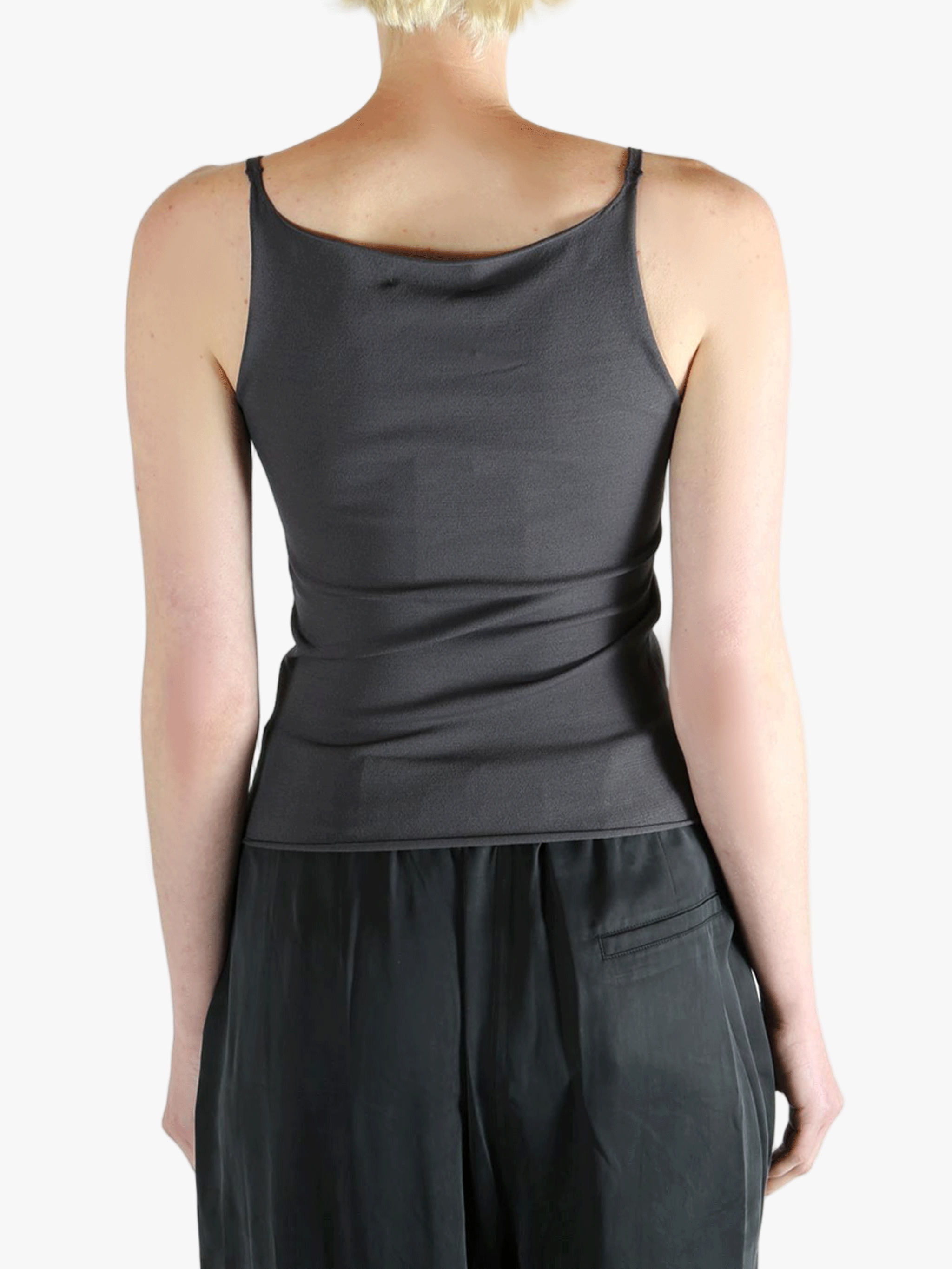 Grey top worn by a person, showing the top fit