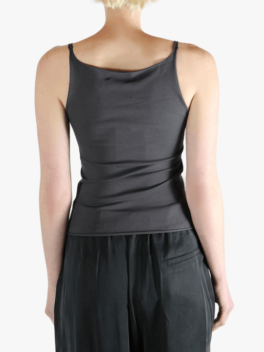 Grey top worn by a person, showing the top fit