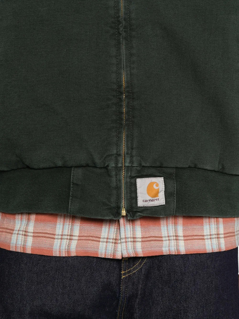 Close up of Green jacket, showing texture of the 100% cotton fabric