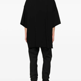 Black t-shirt worn by a person, showing the t-shirt's fit