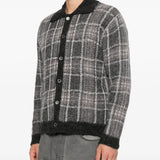 Grey shirt worn by a person, showing the shirt fit