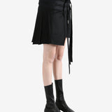 Black skirt worn by a person, showing the skirt's fit