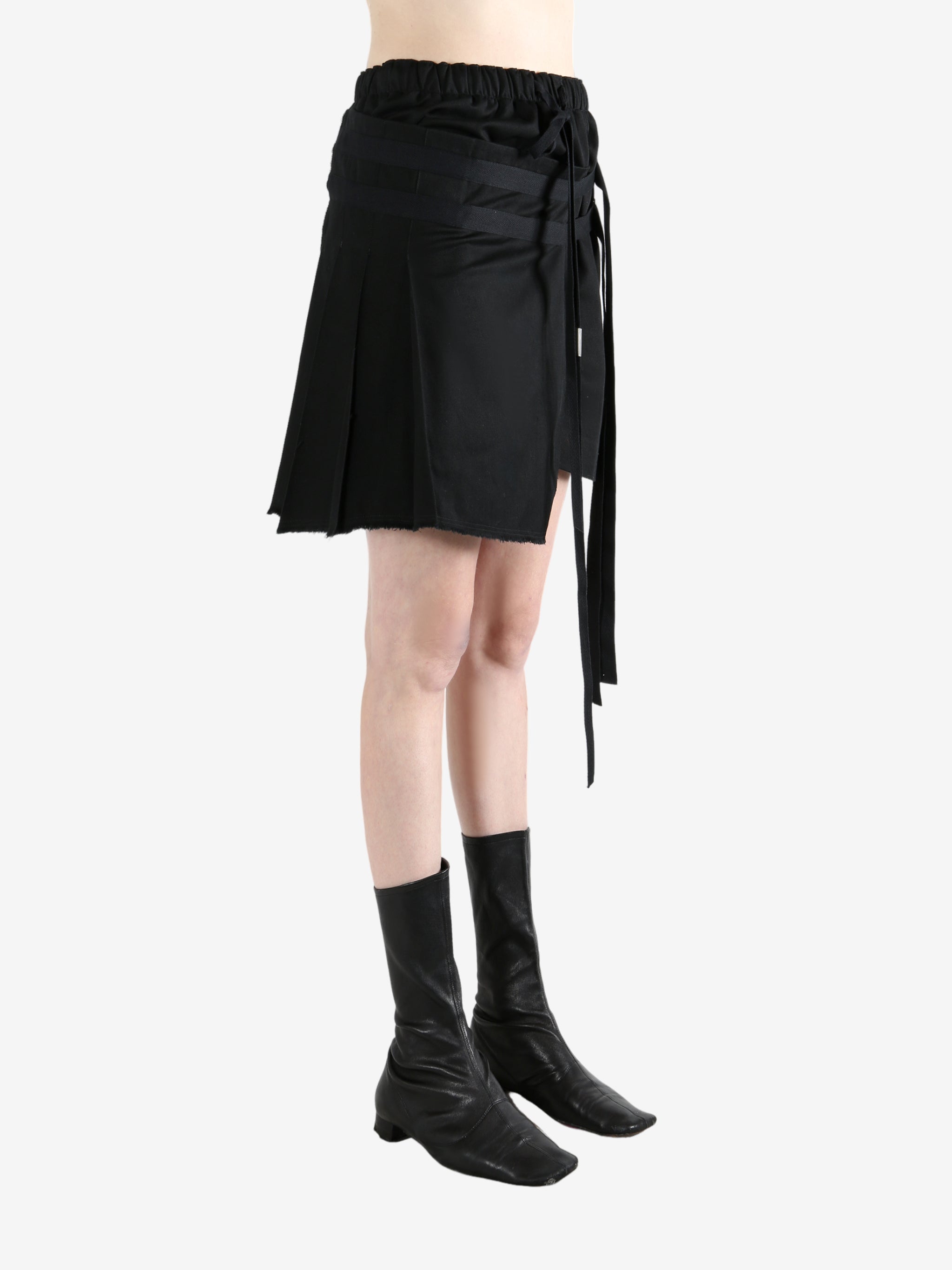 Black skirt worn by a person, showing the skirt's fit