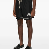 Black shorts worn by a person, showing the shorts' fit