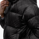 Black jacket worn by a person, showing the jacket fit