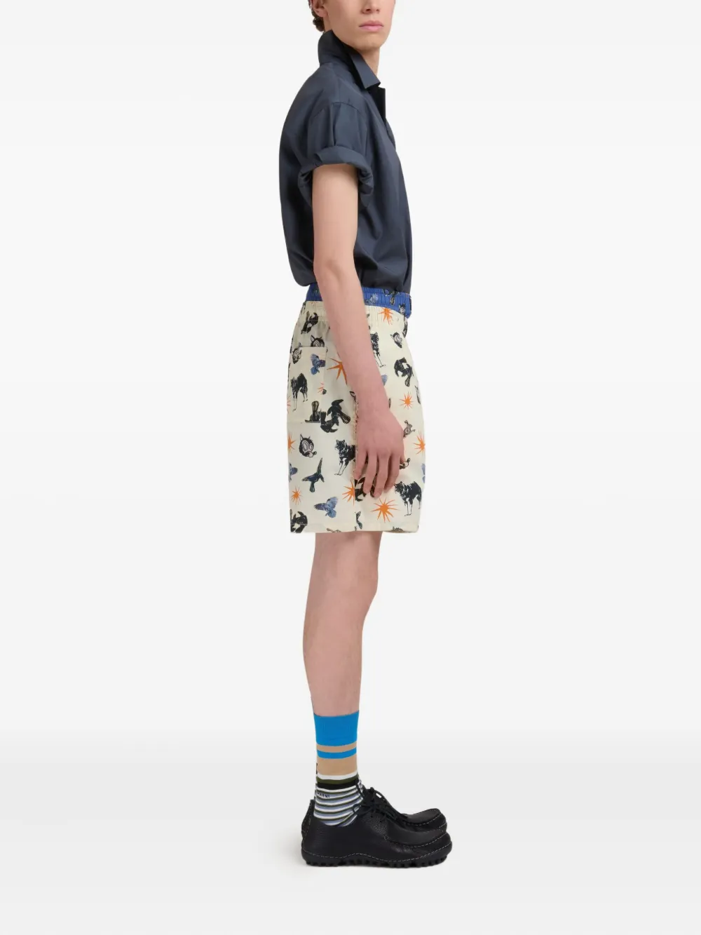 Blue shirt worn by a person, showing the shirt fit