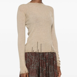 Tan tops worn by a person, showing the tops fit