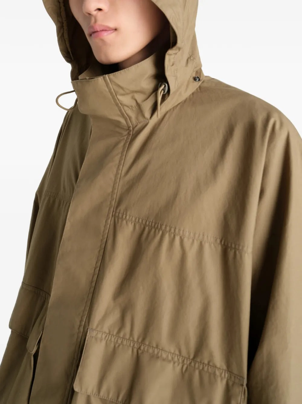 Close up of bronwn jacket, showing texture of the cotton fabric