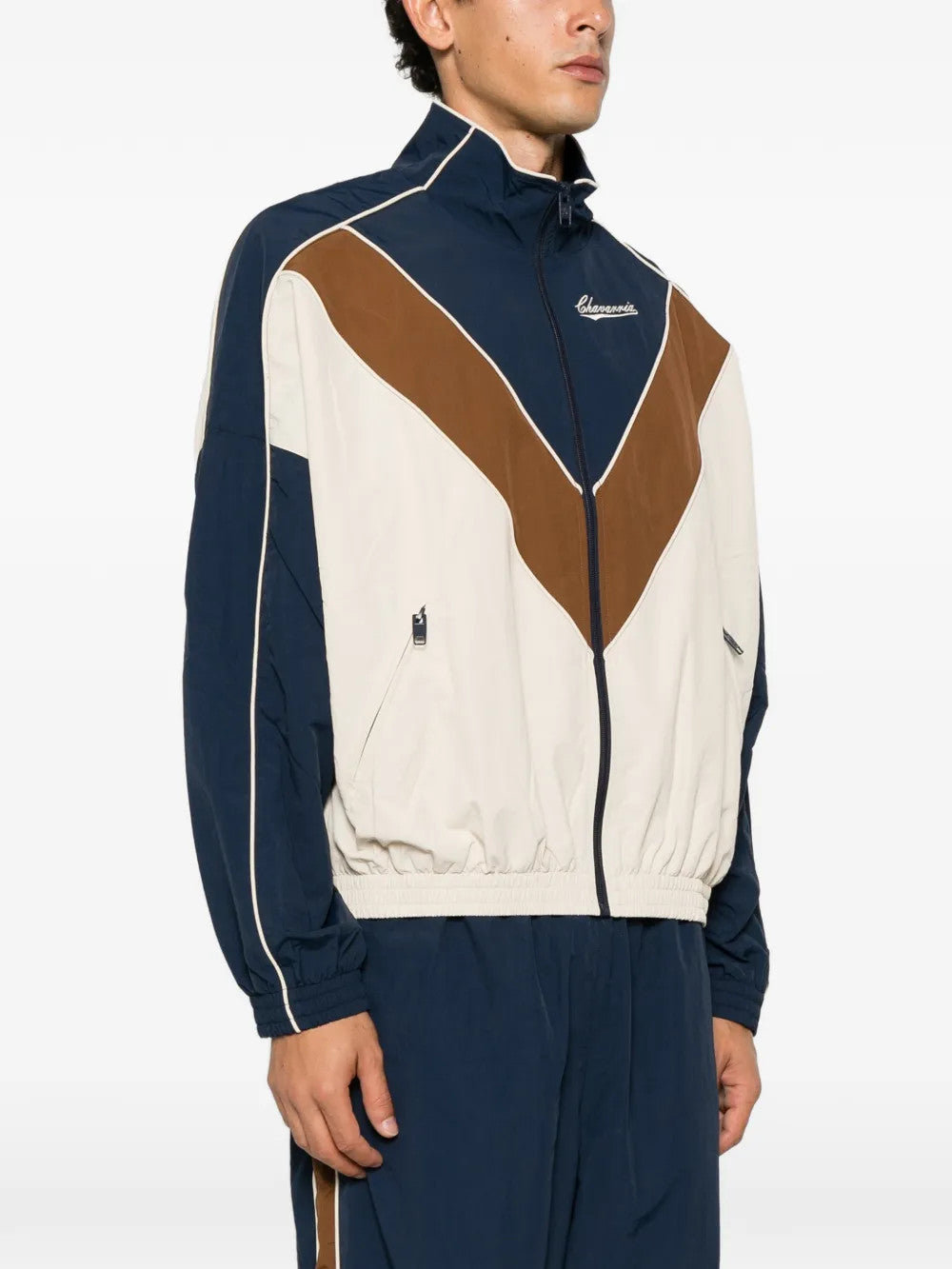 Navy jacket worn by a person, showing the jacket fit