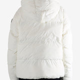 White coat worn by a person, showing the coat's fit