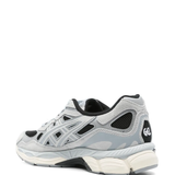 Grey sneakers, back view