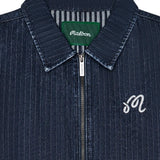 Close up of Navy jacket, showing texture of the 100% cotton fabric