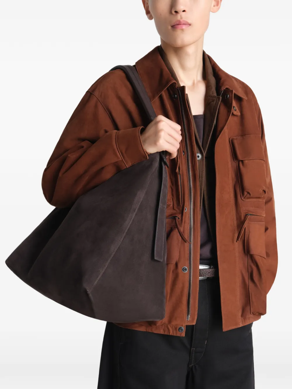 Brown bag worn by a person, showing the bag fit