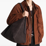 Brown bag worn by a person, showing the bag fit