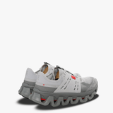 Grey sneakers, back view