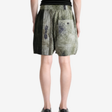 Green shorts, full body view