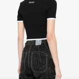 black top worn by a person, showing the top  fit