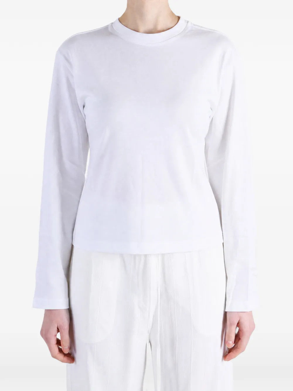 White top, full body view