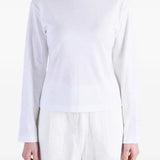 White top, full body view