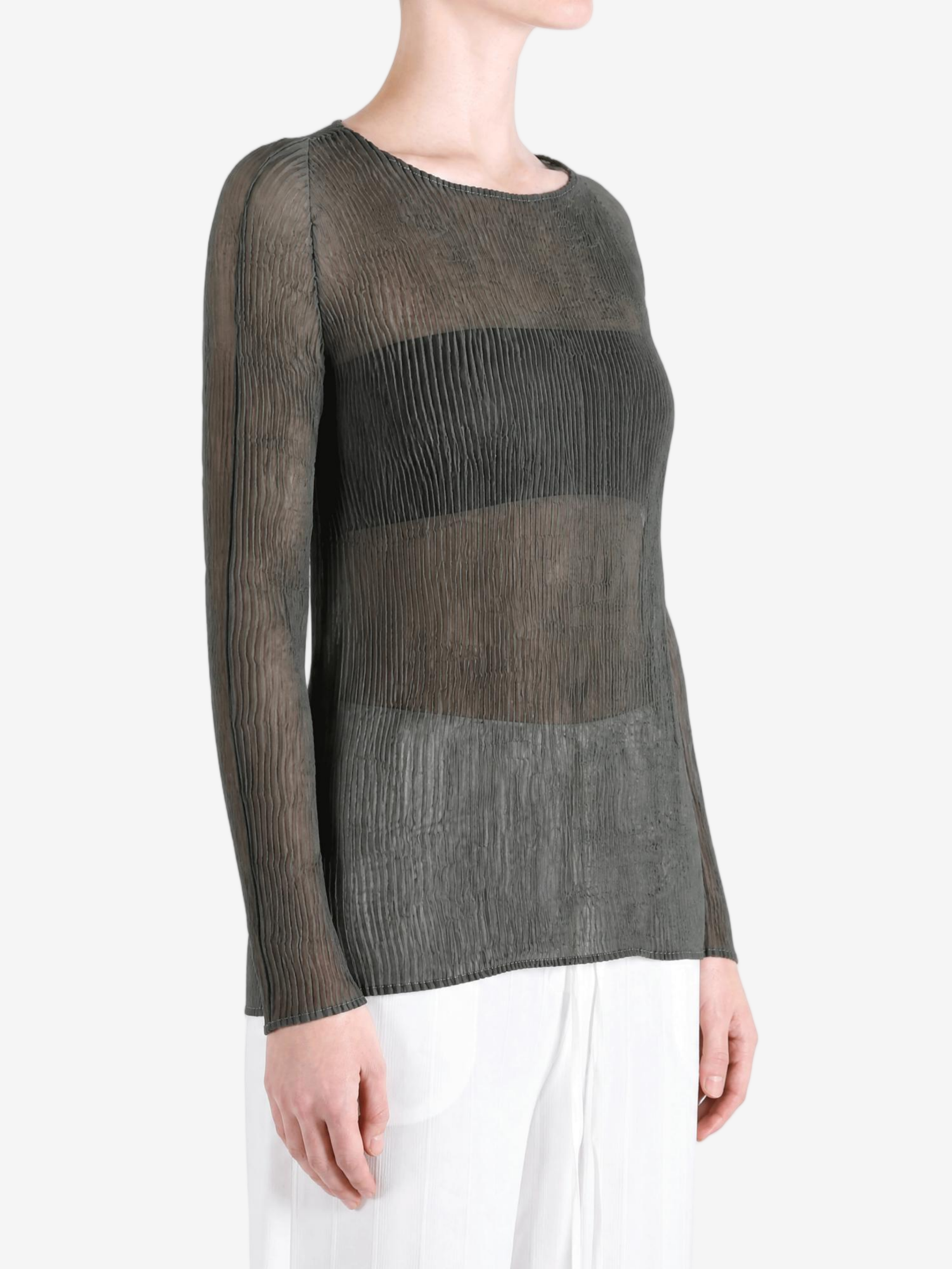 Grey shirt worn by a person, showing the shirt fit