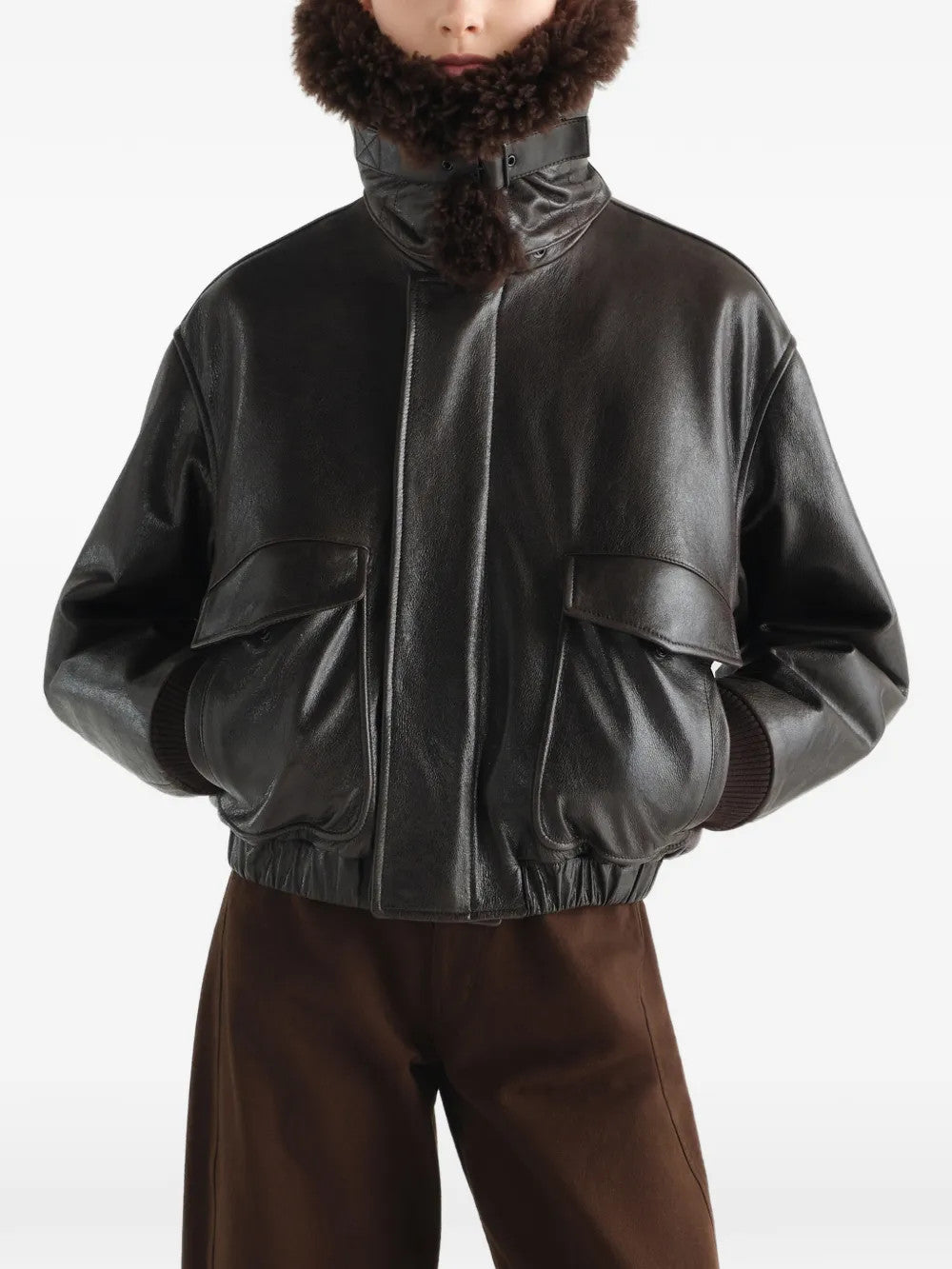 Black jacket worn by a person, showing the jacket fit