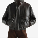 Black jacket worn by a person, showing the jacket fit