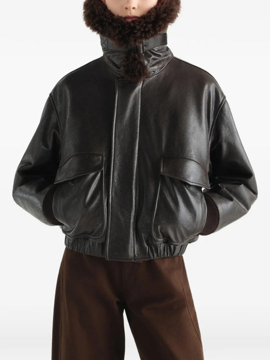 Black jacket worn by a person, showing the jacket fit