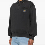 Black sweats worn by a person, showing the sweats' fit