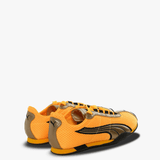 Yellow sneakers, back view