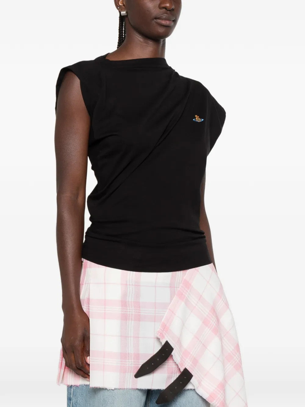 Black top worn by a person, showing the top fit