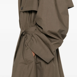 Close up of Brown coat, showing texture of the cotton fabric