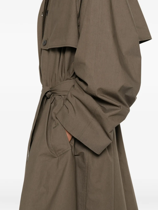 Close up of Brown coat, showing texture of the cotton fabric