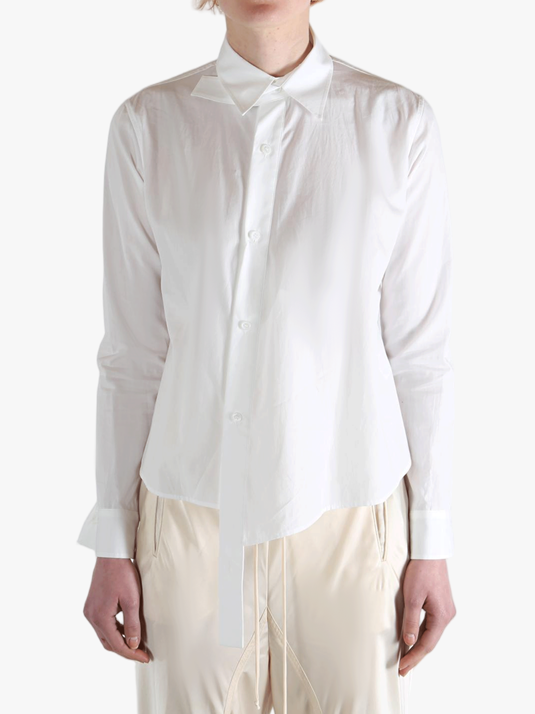 White shirts worn by a person, showing the shirts fit