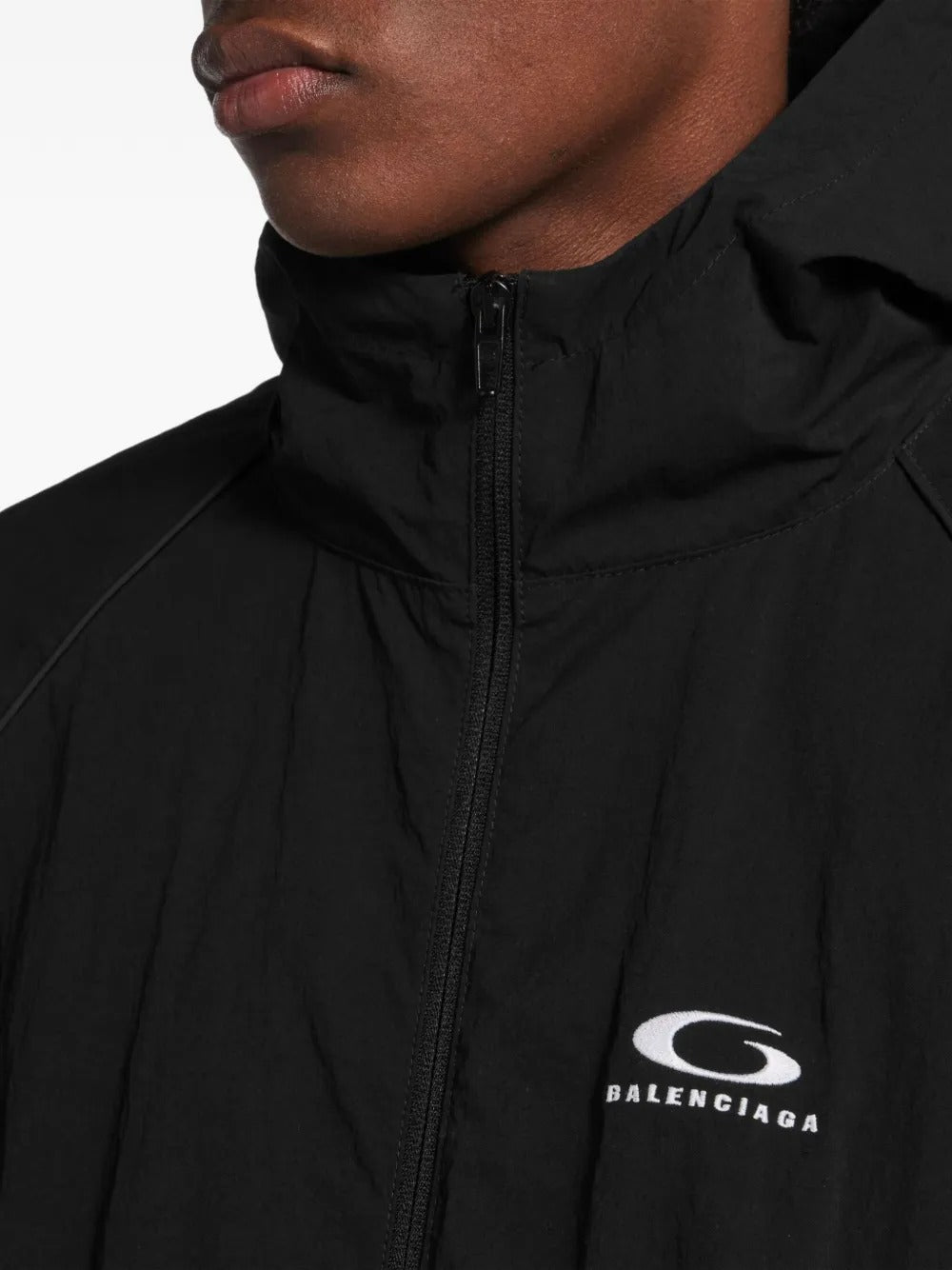 Close up of Black jacket, showing texture of the nylon fabric